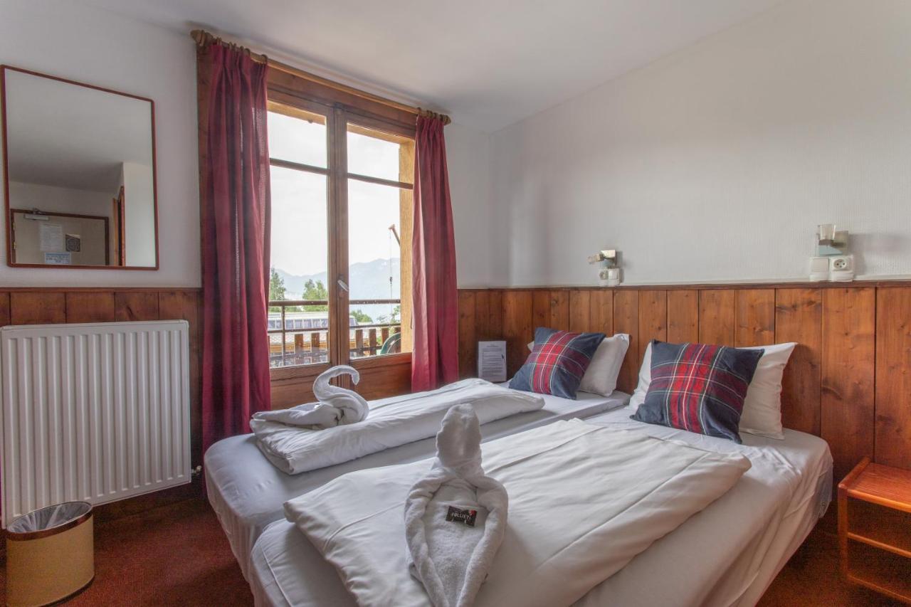 Hotel Le Refuge Alpe d'Huez ภายนอก รูปภาพ